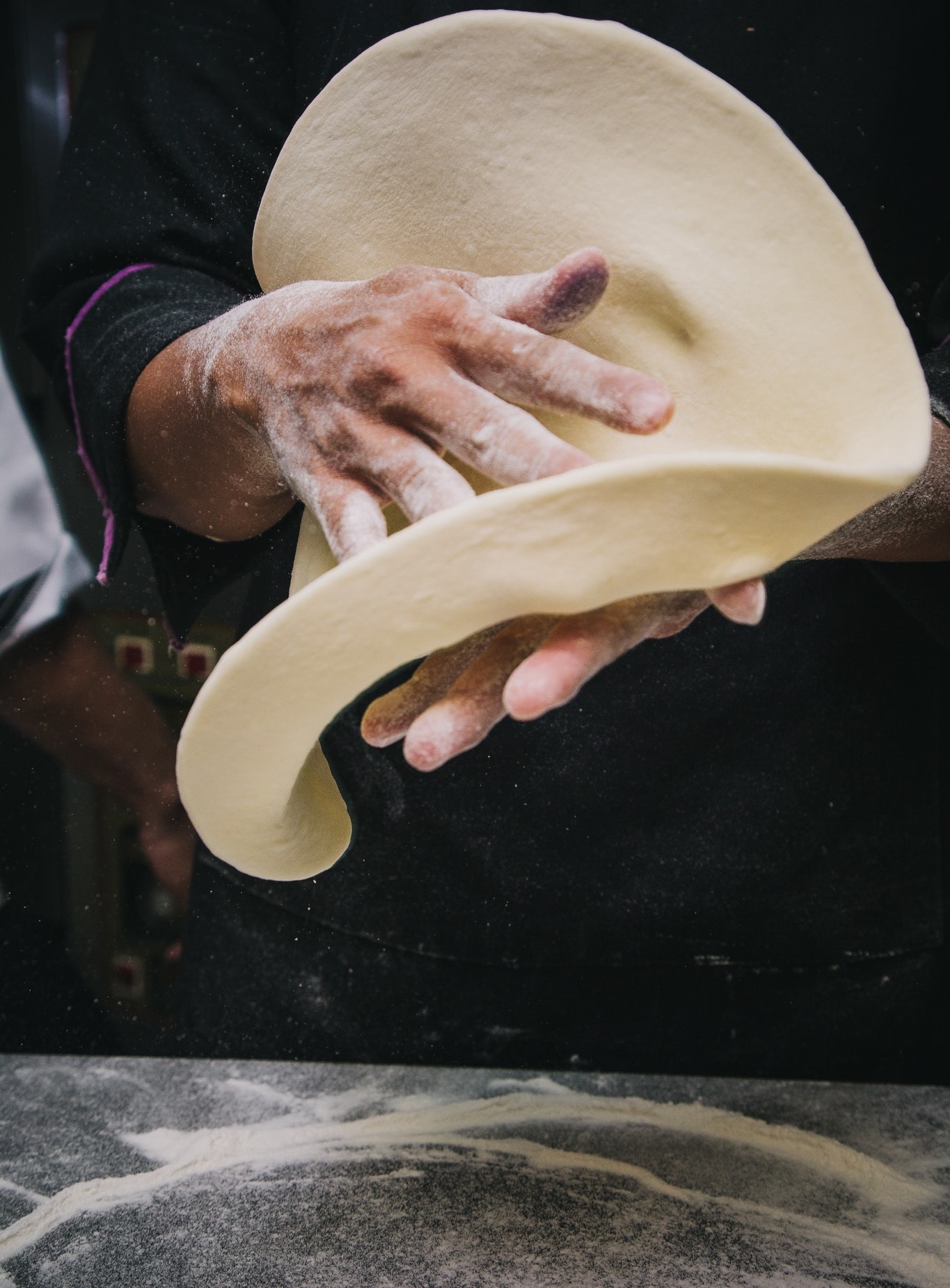 stetching out the dough